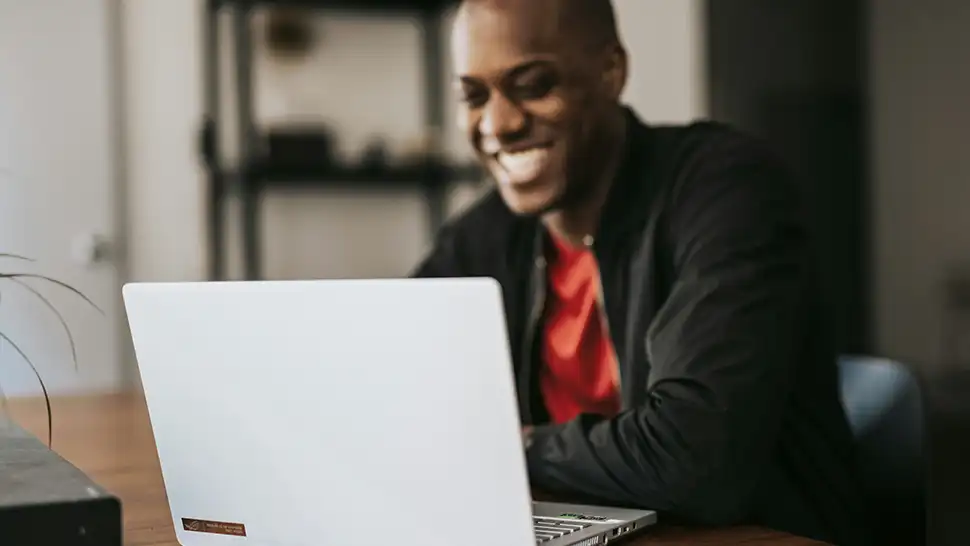 Man reviewing his retirement plan on his computer
